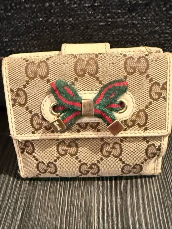 Gucci Handbags - Gucci Beige GG Canvas Bow Bifold Wallet